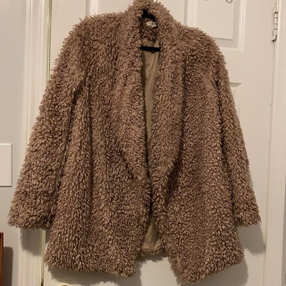 Tan teddy jacket . Mid length